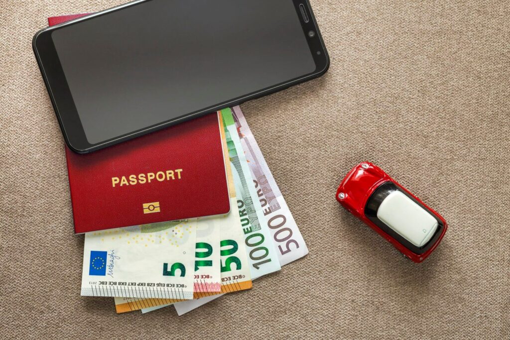 passport-currency-and-phone-planning-a-trip-2026-01-07-06-38-22-utc (1)