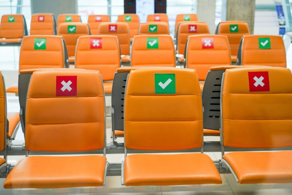 row-of-empty-bench-chair-seats-with-social-distanc-2026-03-18-04-41-33-utc (1)