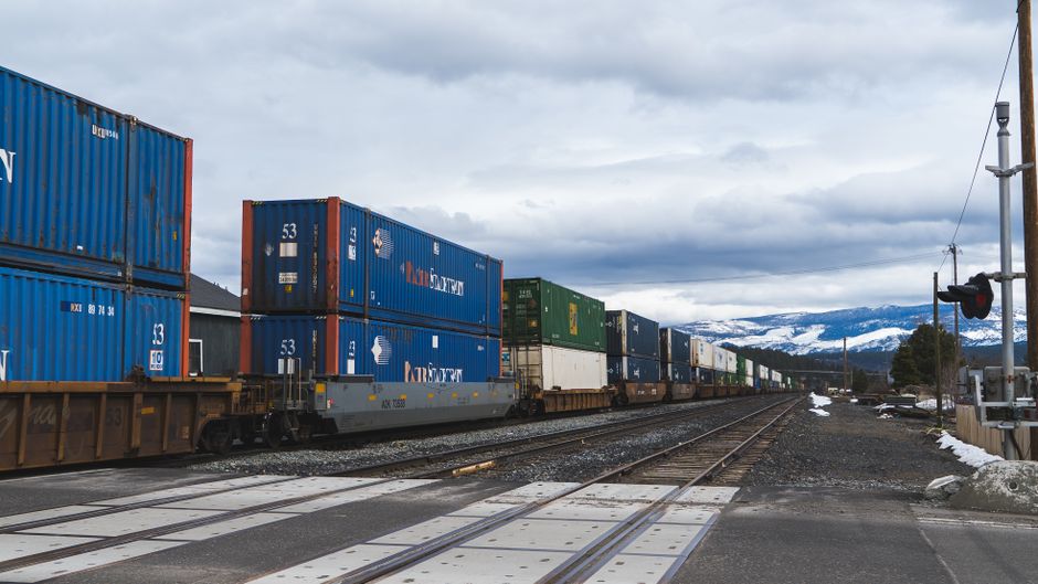 FTL containers from USA loaded at international shipping port preparing for transatlantic voyage